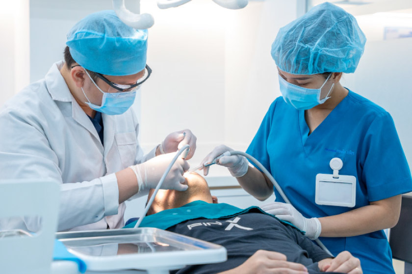 Điều trị mòn men răng nên đến địa chỉ nha khoa uy tín