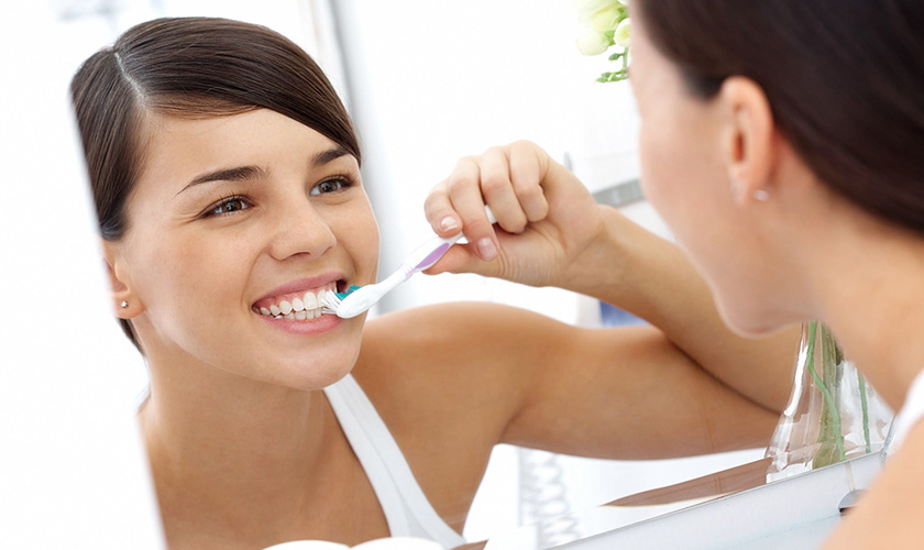 Cần chăm sóc răng miệng kỹ lưỡng sau khi trồng răng khểnh